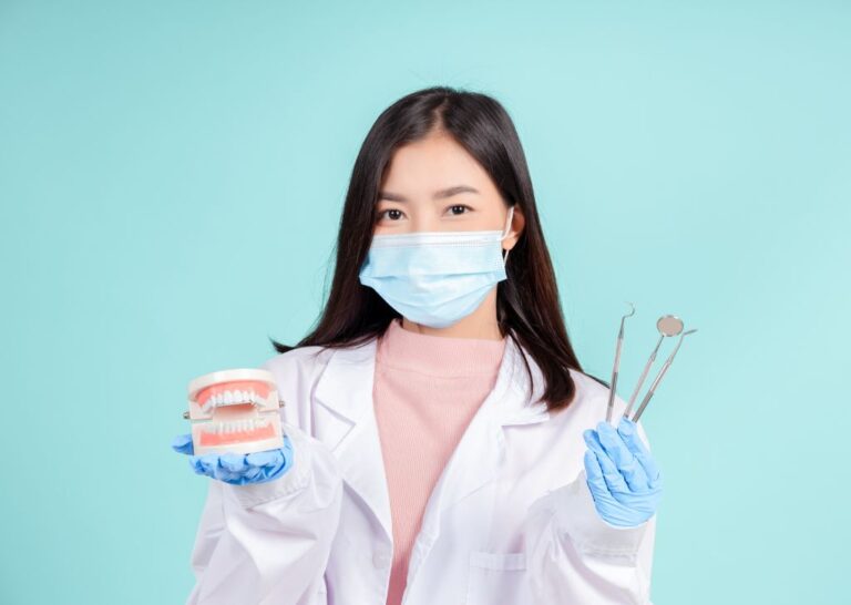 Dentist showing how to grow a dental clinic using SEO vs PPC.