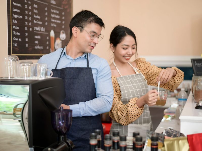 Baristas making and preparing a cup of coffee in coffee shop